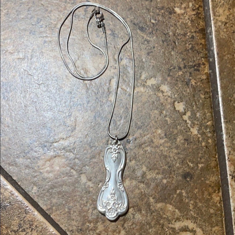 Lovely handcrafted silverware pendant
